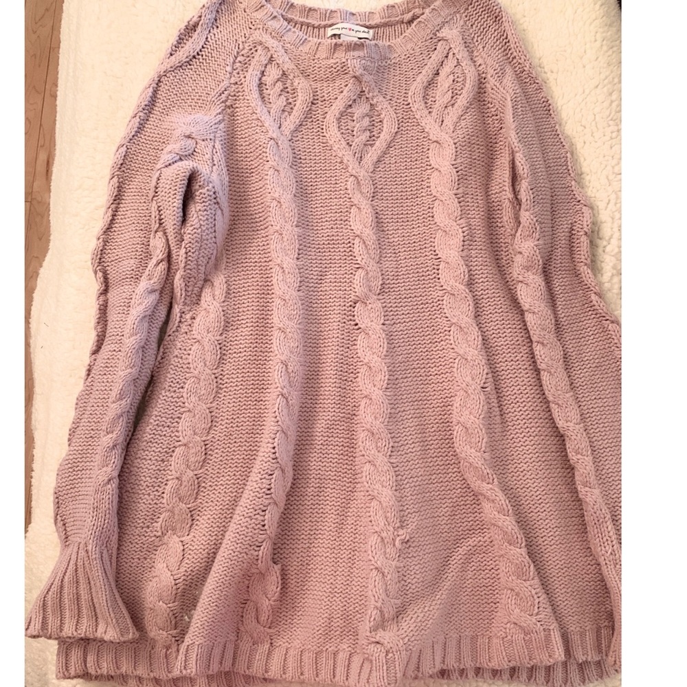 Long knitted sweater